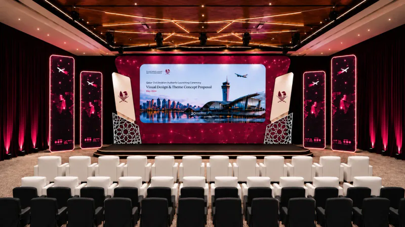 Architectural render of the Qatar Civil Aviation Authority strategy ceremony stage, with magenta screens and white and dark seating